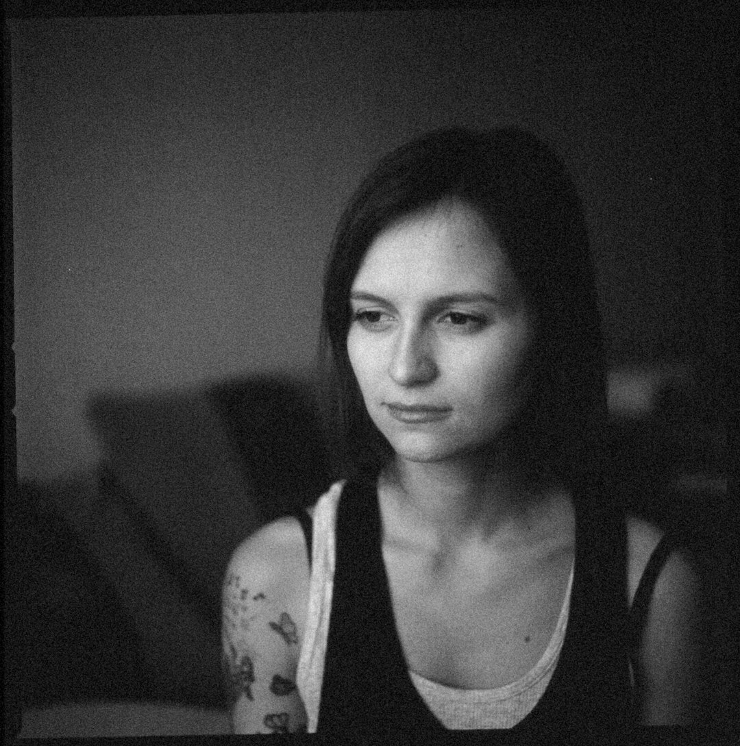 Portrait of a Swiss woman in her mid-forties smiling warmly