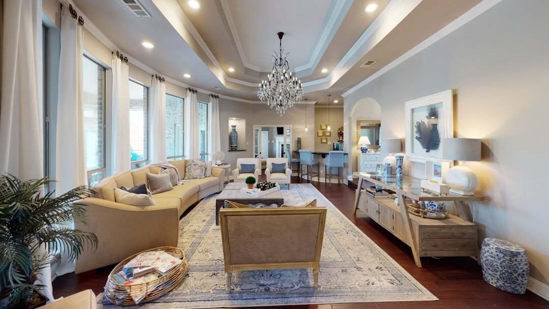 Elegant living room of a luxury 1990s celebrity villa with a fireplace and vintage furniture